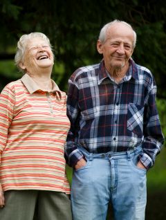 Retired couple laughing